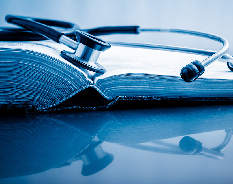 Stethoscope and book